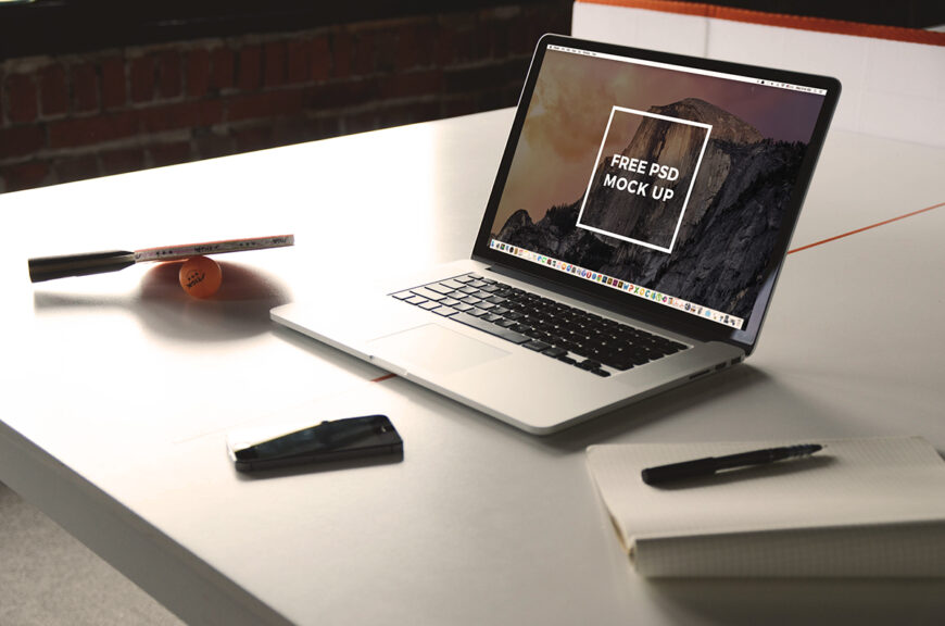 Download Macbook Pro on Table Mockup | Mockup World