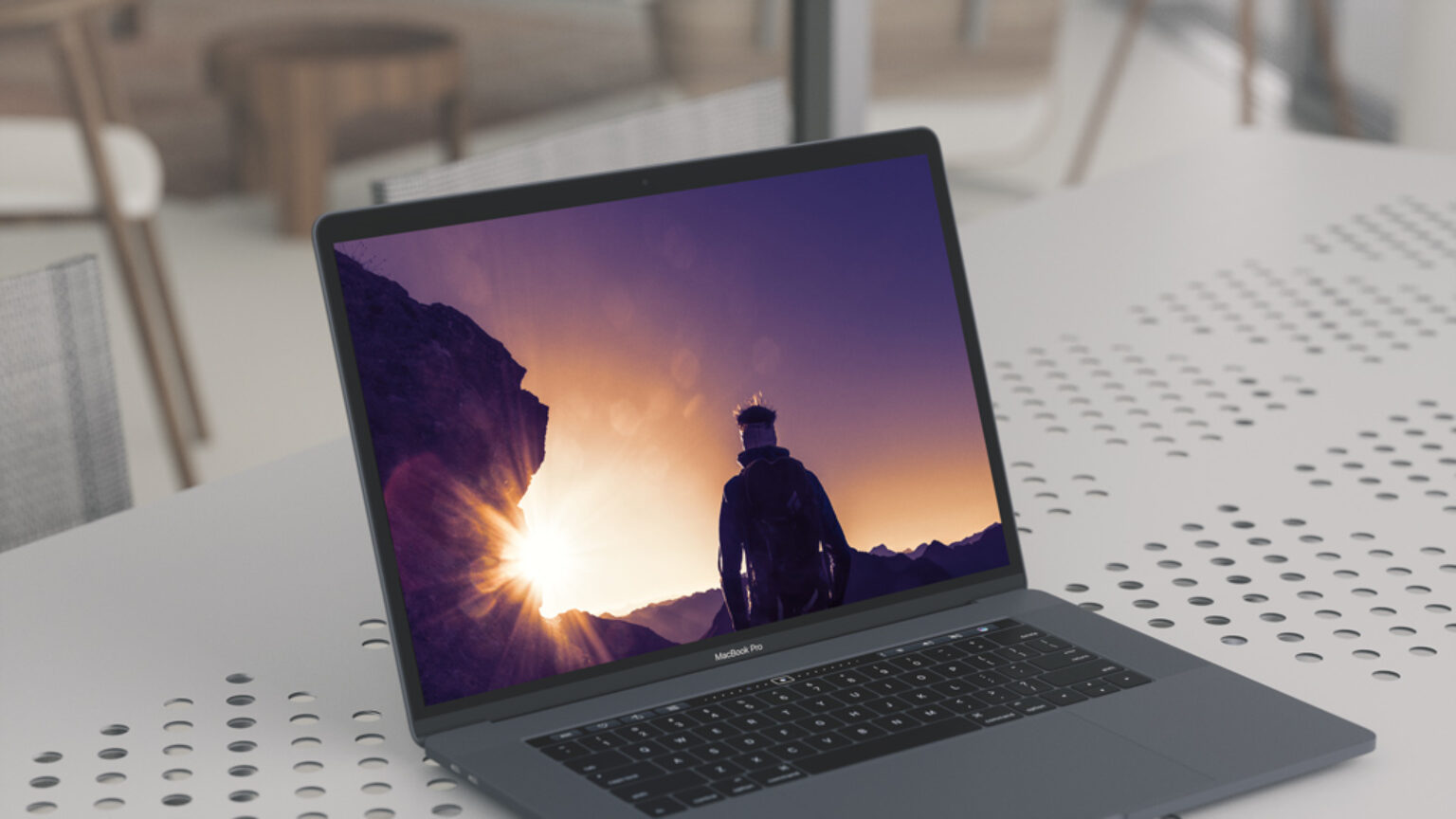 MacBook Pro (Space Grey) On Table Mockup   Mockup World