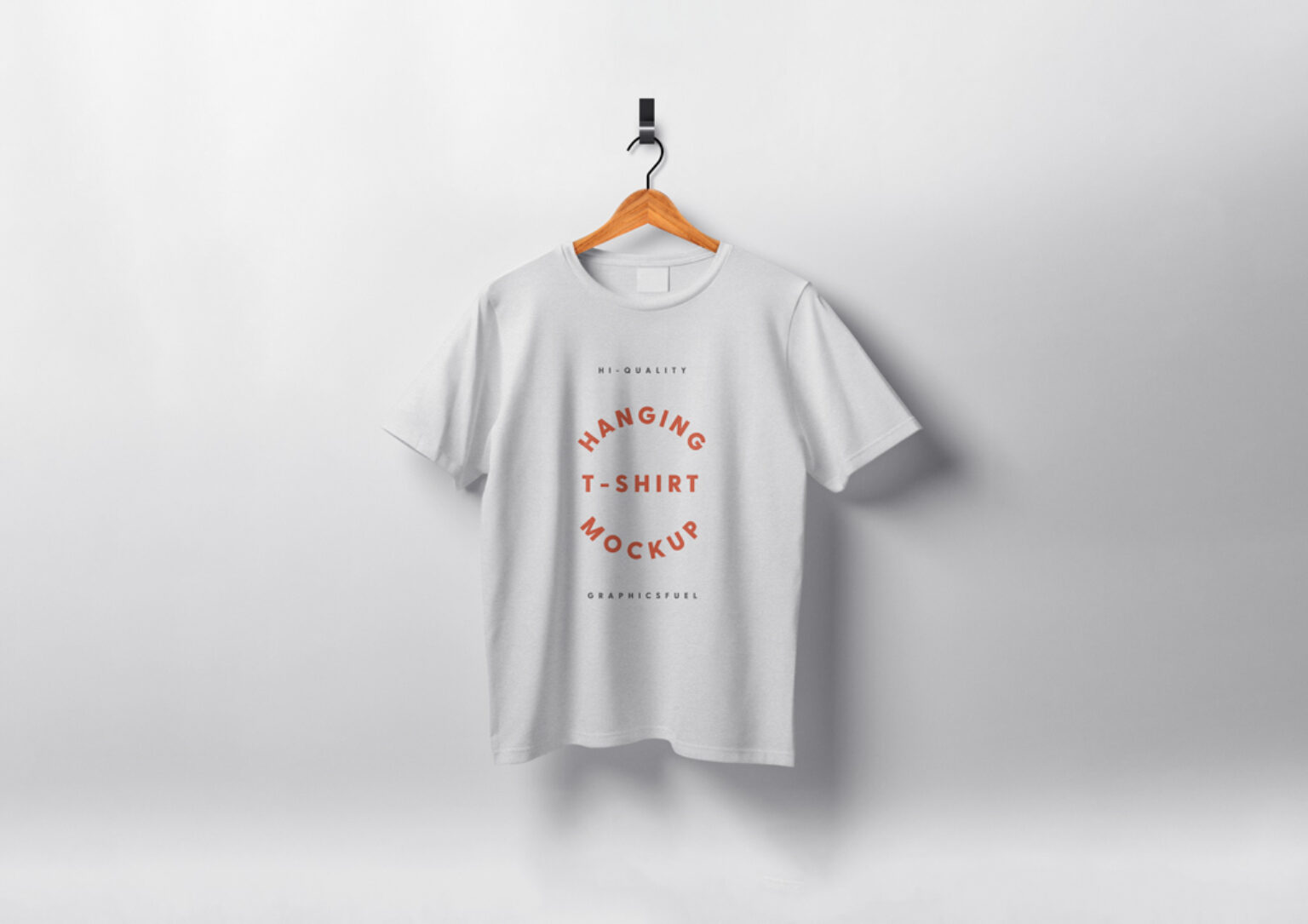 T-Shirt on Wooden Hanger Mockup - Mockup World